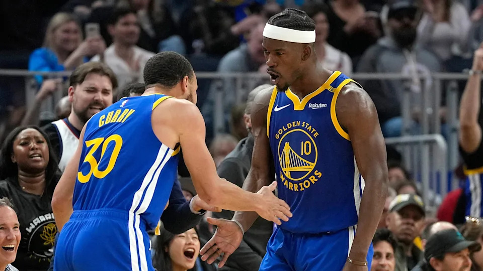 SAN FRANCISCO, CALIFORNIA - FEBRUARY 23: Jimmy Butler III #10 and Stephen Curry #30 of the Golden State Warriors celebrate after Butler scored and was fouled on the shot against the Dallas Mavericks during the first half at Chase Center on February 23, 2025 in San Francisco, California. NOTE TO USER: User expressly acknowledges and agrees that, by downloading and or using this photograph, User is consenting to the terms and conditions of the Getty Images License Agreement. (Photo by Thearon W. Henderson/Getty Images)