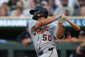 Tigers third baseman Hao-Yu Lee (50) hits a single against the Twins in the third inning.