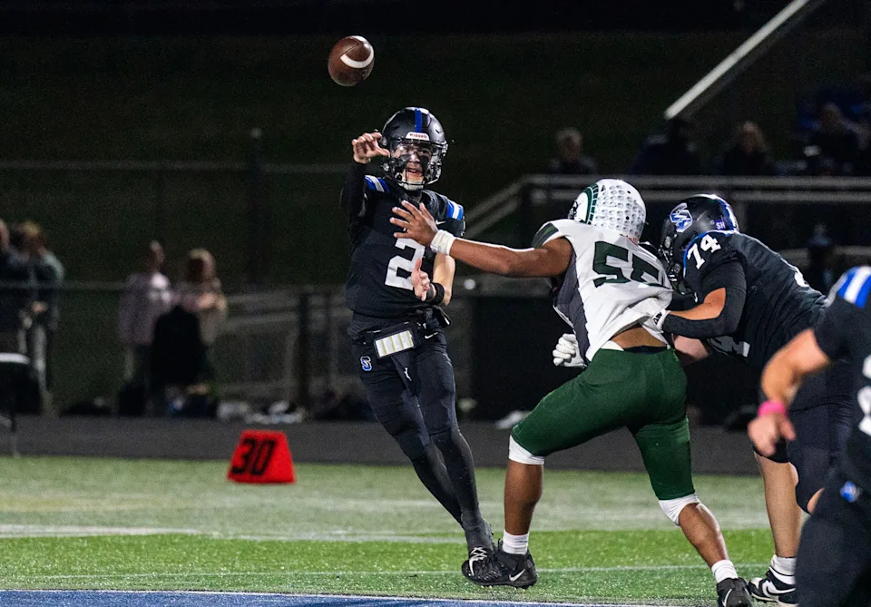 Central Bucks South's Trent Haviland, 2, throws a pass against Pennridge during a high school football game in Warrington on Oct. 30, 2026.