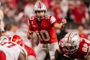 Ohio State Buckeyes quarterback Julian Sayin (10) motions during the NCAA football game against the Maryland Terrapins at Ohio Stadium in Columbus on Oct. 10, 2026.
