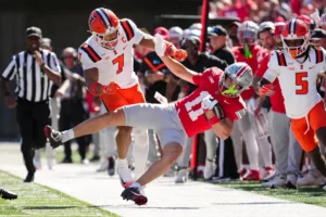 Ohio State Buckeyes wide receiver Brock Boyd (11) is knocked out of bounds by Illinois Fighting Illini defensive back Matthew Bailey (7) during the NCAA football game at Ohio Stadium in Columbus on Sept. 26, 2026.